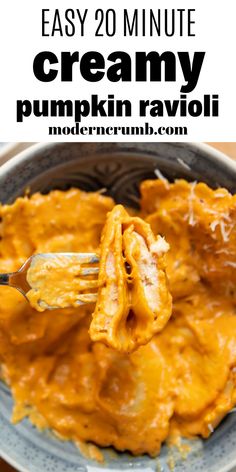 a fork in a bowl filled with creamy pumpkin ravioli