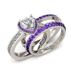 two wedding rings with purple and white stones on them, set in 18k white gold