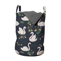 a black and white bag with swans on it