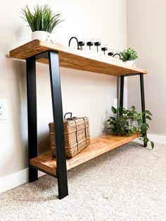 a wooden shelf with some plants on it