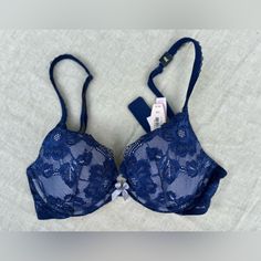 Nwt- Gorgeous Push Up Bra Definitely A Must Have! Xo Body By Victoria Push Up Bra Cobalt Blue Sheer Back Straps Lilac Satin Tiny Front Pink Bow Between Cups Light Padding Adjustable Straps Lined Padded Comfortable Smoke Free Home Elegant Blue Bra For Spring, Fitted Blue Bra With Lined Body, Elegant Stretch Blue Bra, Elegant Blue Spring Bra, Elegant Blue Stretch Bra, Blue Fitted Push-up Bra, Victoria's Secret Blue Underwire Bra, Push Up Strapless Bra, Purple Lace Push-up Bra