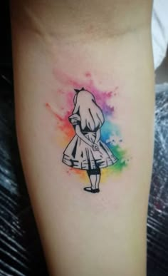 a watercolor tattoo of a girl in a dress