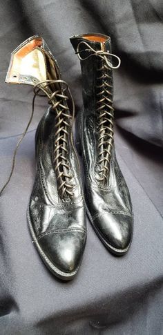 Incredible!  Deadstock ~ Beautiful black lace up boots. Unworn. Leather. New Old Stock ~ NOS  1900's ~ 1910's    Size marked 6 Measuresments: length ~  9 1/2 inches, inside width ~ 2 1/2 inches, outside heel ~ 1 inch Sole Reads: Billiken REG. U.S. PAT. OFF Heel reads: Goodyear Wingfoot J 11 Very good, unworn 1condition. These shoes are a ready to be worn! Buyer to pay all related shipping costs including insurance.  Questions welcome. All Sales final  Thank You CityVintage Black Lace Up Boots, Lake Elsinore, Black High Tops, Vintage Women, Victorian Style, Lace Tops, Victorian Fashion, Work Boots, Lace Up Boots