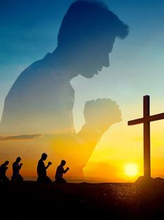 silhouettes of people kneeling in front of a cross