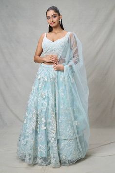 Blue attached cancan lehenga with floral applique thread embroidery. Paired with a floral thread embroidered padded blouse with a tasseled hem and embroidered dupatta. - Aza Fashions Cape Lehenga, Cancan Lehenga, Kurta Lehenga, Lehenga Pattern, Padded Blouse, Lehenga Skirt, Embroidered Lehenga, Embroidered Dupatta, Luxury Sale