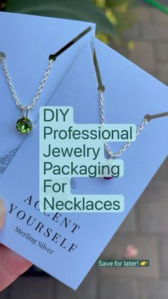 two necklaces are being held up in front of a sign that says diy professional jewelry packaging for necklaces