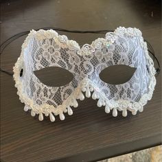 This Is A New White Lace Masquerade Mask With Pearls Outlining The Bottom Boarder Of The Mask. It Is An Elastic Band That Goes Around The Head, But It Is Is Stretchy And Can Be Adjusted For Smaller Sizes If Needed. White Lace Masquerade Mask, Victorian Masquerade Mask, White Lace Headband, Homemade Masquerade Mask, Masquerade Gowns, Masquarade Mask, White Masquerade Mask, Masquerade Ball Dresses, Lace Masquerade Mask