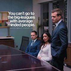 two men and a woman sitting at a table in an office with a quote on it