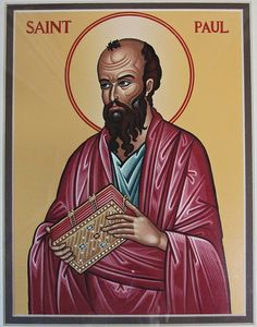 an icon of saint paul holding a book