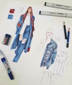 a drawing of a woman's coat and pants with pencils next to it