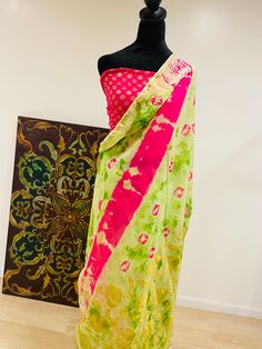 Party wear Tie n Dye print georgette Saree . Comes with contrast pink color Blouse .  Fall n pico already done . Comes with unstitched blouse . Traditional Green Blouse Piece For Summer, Green Unstitched Blouse Piece For Summer, Unstitched Green Blouse Piece For Summer, Traditional Summer Georgette Saree, Fitted Multicolor Organza Traditional Wear, Spring Silk Saree With Sheer Dupatta, Fitted Organza Saree For Summer, Multicolor Chiffon Blouse For Diwali, Green Bohemian Blouse Piece For Summer