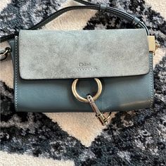 Reposhing This Item I Purchased From @Chs1085. Loved It, But Ready To Rotate For Something New. Questions? Leave A Comment Below! Chloe Faye Bag Blue, Faye Bag, Chloe Bags, Chloe Bag, Blue Leather, Blue And Silver, Something New, Chloe, Bag Lady