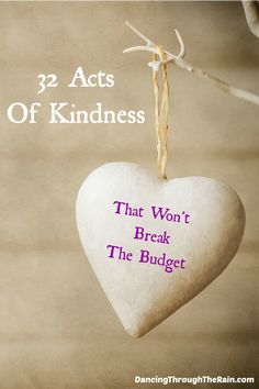 a heart hanging from a branch with the words, 22 acts of kindness that won't break the budget