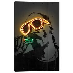 a neon sign with sunglasses on it and a man's face in the background