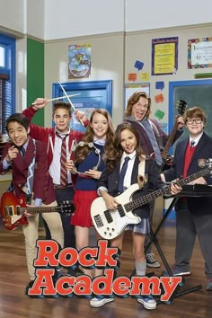 the cast of rock academy posing for a photo