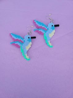 the earrings are made out of plastic beads