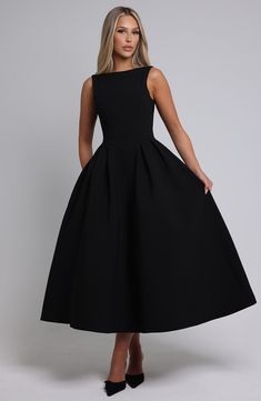 Clarabella is a chic and timeless addition to your wardrobe. Crafted in our luxe crepe fabric with a high, wide boat neckline and low scoop back, it features seam detailing to the body for a contoured shape. The dress cinches at the waist for the silhouette of dreams, contrasted by a full skirt made with tulle for extra volume. Wear with soft waves and neutral heeled mules for a chic finish. 



Colour: Black.

Premium non-stretch crepe.

Fully lined.

High, wide boat neckline.

'V' shaped waist Homecoming Dresses Corset, White Dress Spring, Midi Dress Wedding Guest, Split Long Dress, Maxi Dress Sale, Maxi Dress Navy, Sparkle Dress, Soft Waves, Stretch Crepe