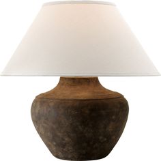 a brown vase with a white shade on it's side and a light in the middle