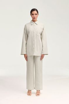 Introducing the Adalila Linen Button Down Top in Oatmeal. Crafted from luxurious linen, this top exudes effortless elegance with its classic button down design and straight sleeves. Comfort meets sophistication, making it a must-have for any wardrobe. Model is 5'7" and is wearing size XS. Beige Linen Button-up Shirt, Linen Button-up Shirt For Daywear, Linen Shirt With Button Cuffs For Daywear, Neutral Collared Linen Shirt, Classic Neutral Linen Tops, Flax Linen Top With Button Closure, Classic Neutral Linen Top, Neutral Linen Button-up Top, Beige Linen Blouse With Button Closure