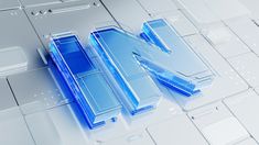 the letter w is made up of blue glass blocks and plastic pieces on top of each other