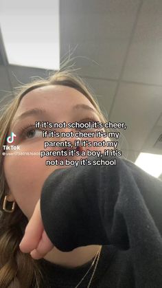 a woman sticking her tongue out in front of the camera with a quote on it