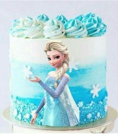 a frozen princess cake with frosting on top