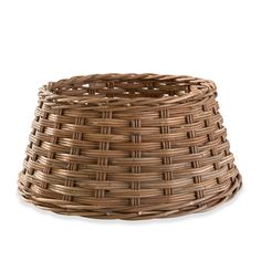 a brown basket sitting on top of a white surface