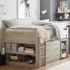 a bedroom with a bed, desk and shelves