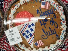 a birthday cake with an american flag and stars on it is for sale at the store