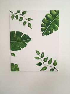 a painting of green leaves on a white background