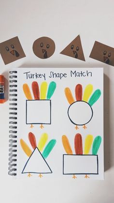 the turkey shape match is made with construction paper and colored crayon pencils