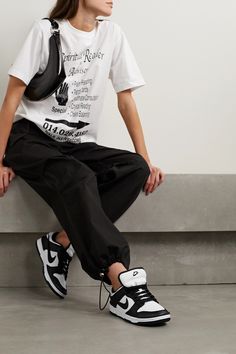 Nike's 'Dunk' sneakers first debuted in 1985, and remain just as iconic and popular today. This low-top 'Twist' style is made from leather in the coveted black and white 'Panda' colorway and has padded collars and foam midsoles for cushioned support. Low Sneakers Outfit, Nike Dunk Low Outfit Woman, Dunk Low Outfit Women, Nike Dunk Low Twist, Nike Dunk Panda, Nike Dunk Low Outfit, Panda Outfit, Best Winter Outfits, Twist Style