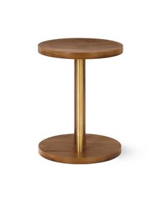 a round wooden table with gold metal legs