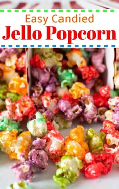 a bag full of jello popcorn sitting on top of a white table with the words, easy candied jello popcorn