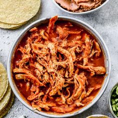 an overhead shot of mexican food with tortillas and salsa