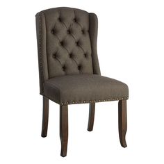 a gray upholstered chair with studding on the back and legs, against a white background