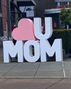 a large sign that says you love mom