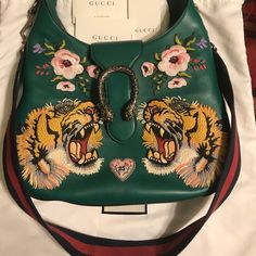 Gucci Dionysus Tiger Messenger Bag. Rich Green With Ornate Stitching Throughout. Inside Suede And Leather Exterior. Silver Hardware. Magnetic Closure Flap With Original Dionysus Fixture. Tags And Dust Bag Included. Practically New Condition! Two Way Messenger Or Top Handle Bag. Ask For More Details ! Gucci Mini Dionysus Bag Green, Gucci Green Dionysus Bag, Gucci Bag Dionysus, Vintage Gucci Shoulder Bag With Gold-tone Hardware, Luxury Gucci Bag With Gold-tone Hardware, Gucci Bags, Gucci Dionysus, Messenger Bag, Dust Bag