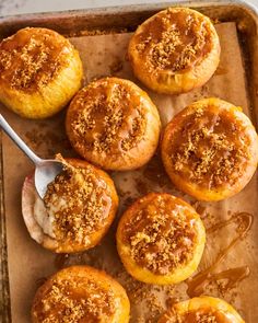 baked desserts on a baking sheet with spoon