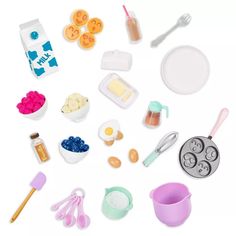 there are many different items that can be found in the play kitchen set on the table