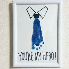 a blue and white painting with the words you're my hero on it