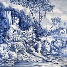 a blue and white tile mural depicting two women sitting on the ground next to animals