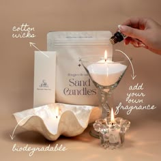 a candle is being poured into a glass next to an empty bag and some other items