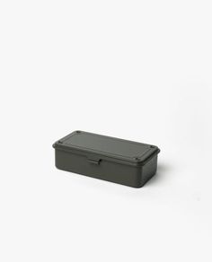 an empty black box sitting on top of a white surface