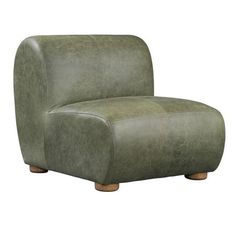 a green leather chair with wooden legs