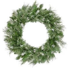 a green wreath with snow on it