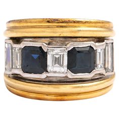 Vasari Sapphire Diamond Gold 18K Ring. Signed Vasari. Can be polished upon request. Sapphire weight: approximately estimated 0.60-0.80 carat each. Diamond total weight: approximately estimated 1.00 carat. Total weight: 13.84 grams. Size: 52 / 6 US. Luxury Yellow Gold Sapphire Ring In Platinum, Luxury Platinum Sapphire Ring In Yellow Gold, Luxury Multi-stone Sapphire Baguette Cut Ring, Luxury Emerald-cut Sapphire Ring With 17 Jewels, Luxury Yellow Gold Baguette Sapphire Ring, Luxury Yellow Gold Sapphire Ring With Vvs Clarity, Formal Multi-stone Baguette Cut Sapphire Ring, Baguette Cut Multi-stone Sapphire Ring For Formal Events, Baguette Cut Multi-stone Sapphire Ring For Formal Occasions