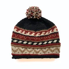 This 100% wool stocking hat keeps you warm and looking good . It is fully lined with soft fleece. It's sure to be a great look on both men and women. Handmade in Nepal Materials: 100% wool (outer), polar fleece (interior) One size fits most Cold water hand wash (or dry clean); lay flat to dry With every product you purchase, you are helping provide employment, educational opportunities and medical care to artisans in Nepal. Warm Wool Bonnet For Fall, Cozy Wool Hats For Cold Weather, Cozy Wool Bonnet For Winter, Cozy Winter Wool Hat, Warm Wool Hats For Fall, Red Bonnet For Winter, One Size Fits Most, Red Winter Bonnet, One Size Fits Most, Red Winter Bonnet (one Size Fits Most), Wool Winter Beanie One Size