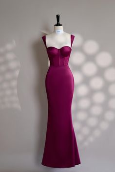 This enchanting magenta-pink gown features wide, elegant straps that add both support and style to the sleeveless design. The corset-style bodice offers a flattering fit, sculpting the upper body to perfection and creating an hourglass silhouette. Flowing gracefully into a mermaid-style skirt, the dress highlights curves beautifully as it flares out at the knees, adding a touch of dramatic elegance. The rich magenta hue is both bold and sophisticated, making it a perfect choice for those who want to stand out. Ideal for formal events, this dress promises a memorable and striking appearance. - This is Handmade item according to your own orders. - 100% real photos. ----------------------- FABRIC & COLOR: - Fabric: Satin.  ----------------------- SIZING DETAILS: - Our model is 5"6 tall and we Magenta Dress Formal, Magenta Wedding Dress, Dark Pink Gown, Magenta Formal Dress, Made Of Honor Dress, Magenta Pink Dress, Magenta Gown, Dark Pink Dress, Pink Dress Long