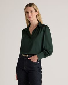 A cross between a classic polo and a feminine blouse, this softly ruched pullover is a fresh spin on the silk shirt. Crafted from premium mulberry silk with a hint of stretch, our Washable Stretch Silk Split Neck Blouse feels incredibly soft and silky to the touch but is incredibly easy to care for. With a gorgeous drape and relaxed cut, it's sure to be your new go-to.  | Quince | Women's Washable Stretch Silk Split Neck Blouse in Forest Green, Size XS, Mulberry Silk Quince Green, Quince Tops, Green Silk Shirt, Red Silk Blouse, Office Clothing, Silk Clothes, Feminine Blouses, Woven Top, Green Blouse